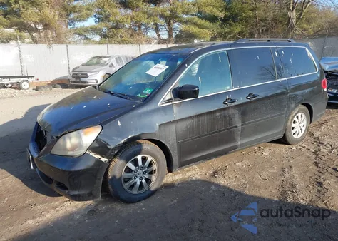2010 Honda Odyssey Ex-L z USA, uszkodzony, nr VIN 5FNRL3H64AB106589